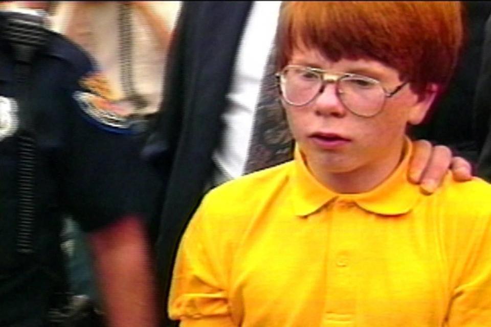 Eric Smith is escorted by police outside court in 1993 / Credit: WROC-TV