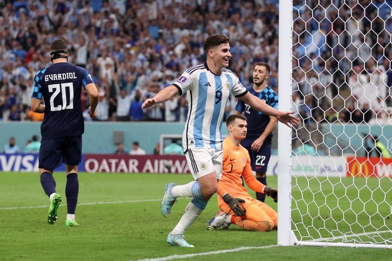 LUSAIL CITY, QATAR - DECEMBER 13: Julian Alvarez of Argentina celebrates after scoring the team's third goal during the FIFA World Cup Qatar 2022 semi final match between Argentina and Croatia at Lusail Stadium on December 13, 2022 in Lusail City, Qatar. (Photo by Lars Baron/Getty Images)