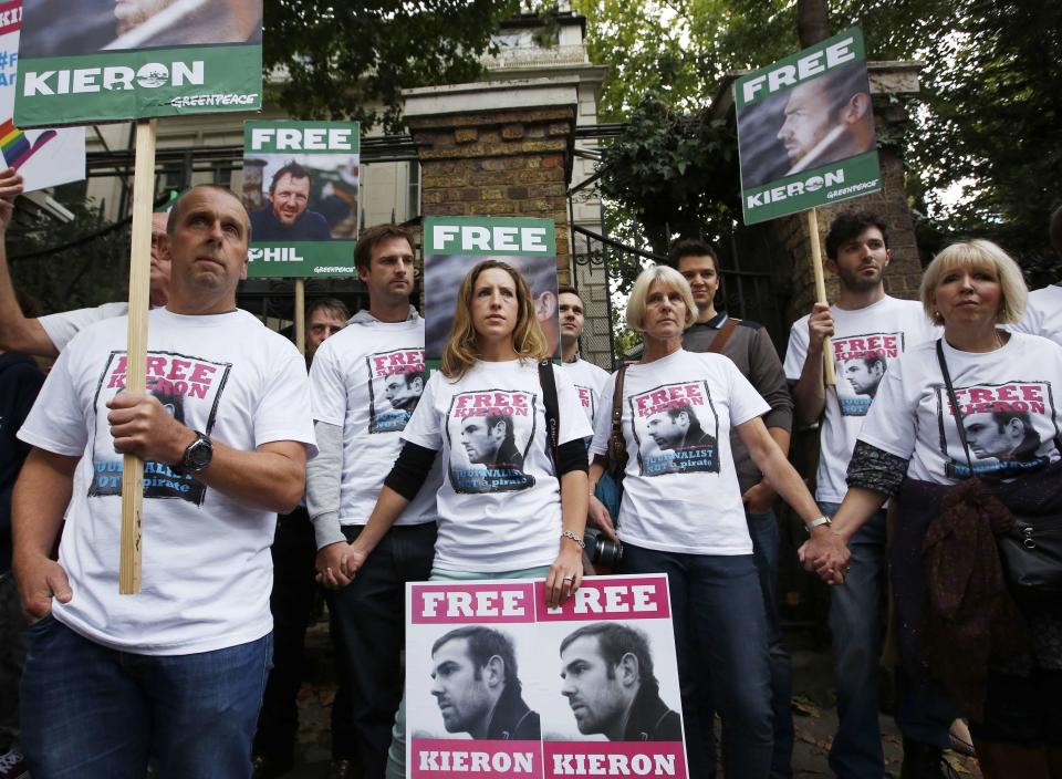 Family and friends of Greenpeace activist Kieron Bryan who is detained in Russia protest outside the Russian Embassy in London