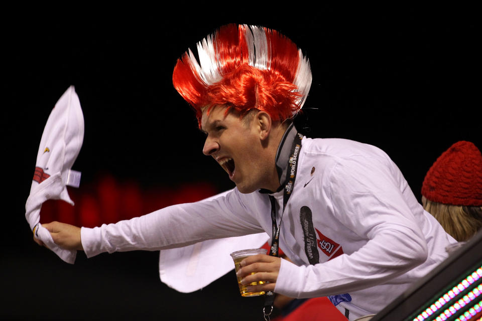 ST LOUIS, MO - OCTOBER 20: A St. Louis Cardinals fan cheers during Game Two of the MLB World Series against the Texas Rangers at Busch Stadium on October 20, 2011 in St Louis, Missouri. (Photo by Doug Pensinger/Getty Images)