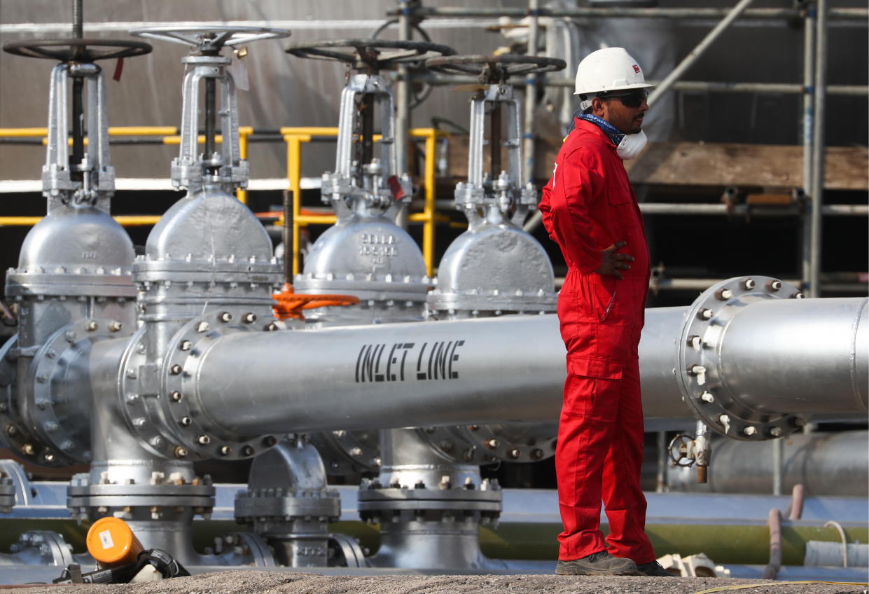 EASTERN PROVINCE, SAUDI ARABIA - OCTOBER 12, 2019: A worker at an oil processing facility of Saudi Aramco, a Saudi Arabian state-owned oil and gas company, at the Abqaiq oil field. On 14 September 2019, two of the major Saudi oil facilities, Abqaiq and Khurais, suffered massive attacks of explosive-laden drones and cruise missiles; the Houthi movement, also known as Ansar Allah, claimed responsibility for the attacks. Stanislav Krasilnikov/TASS (Photo by Stanislav Krasilnikov\TASS via Getty Images)