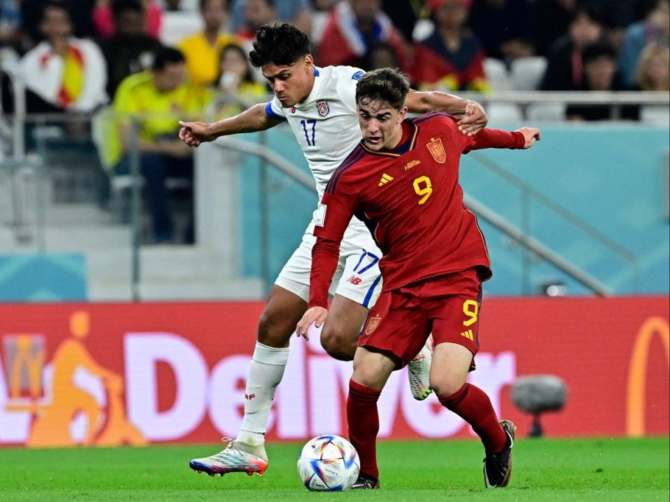 Gavi (right), 18, scored a clever volley with the outside of his boot (AFP via Getty Images)