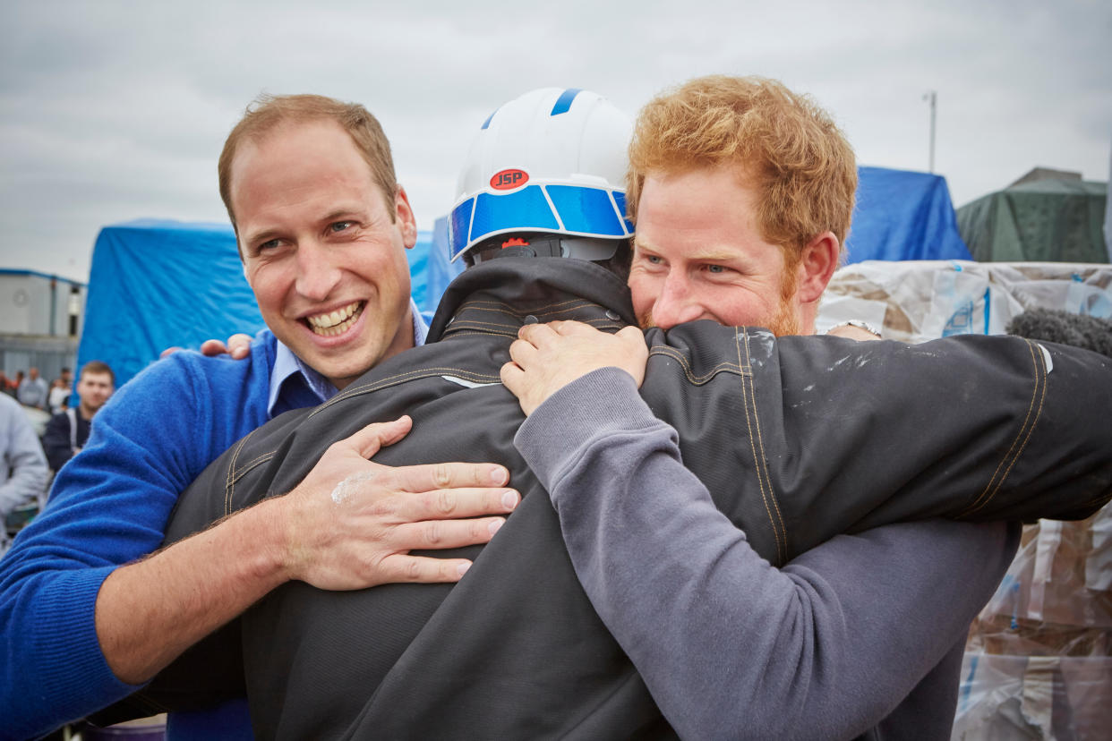 Nick Knowles hugs Prince William and Prince Harry