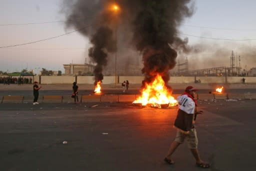 Protesters burnt tyres as they held huge rallies demanding a complete overhaul of the political system
