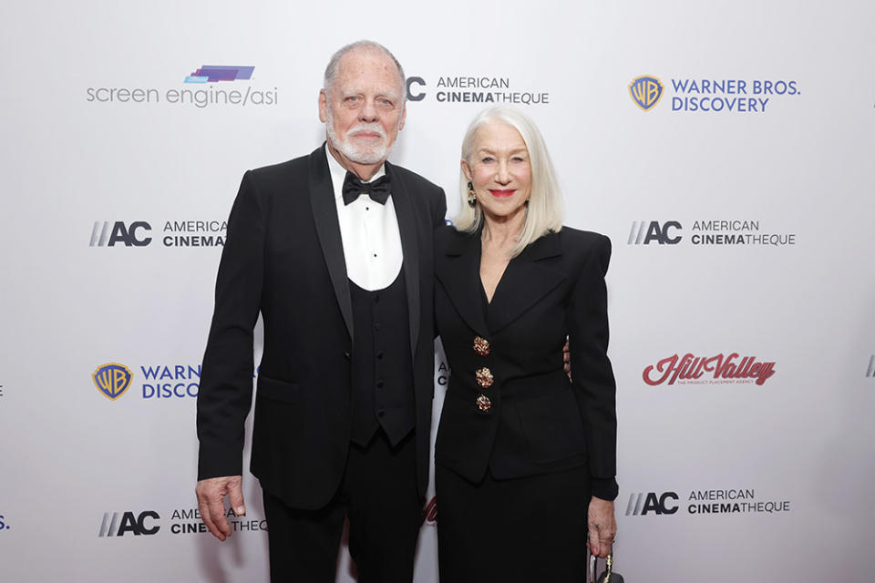 Taylor Hackford and Helen Mirren attend the 37th Annual American Cinematheque Awards at The Beverly Hilton on February 15, 2024 in Beverly Hills, California.