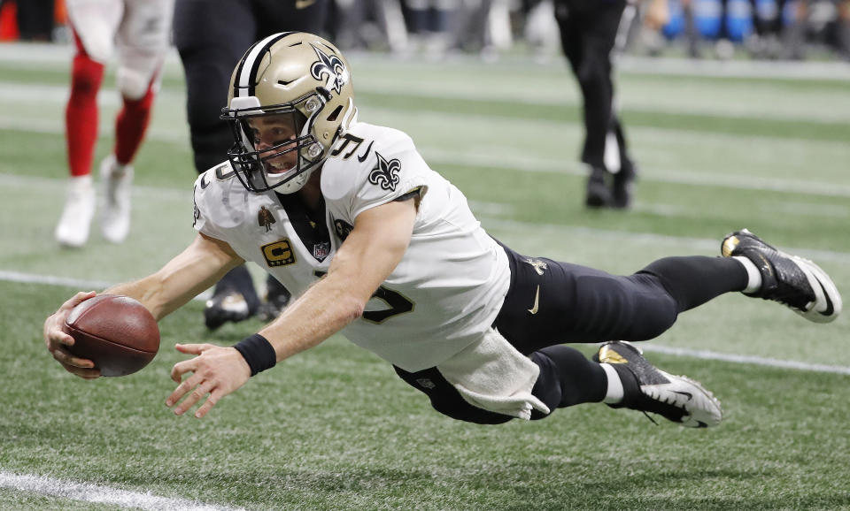 Drew Brees had another amazing day in his legendary career in a big overtime win over the Falcons. (AP)