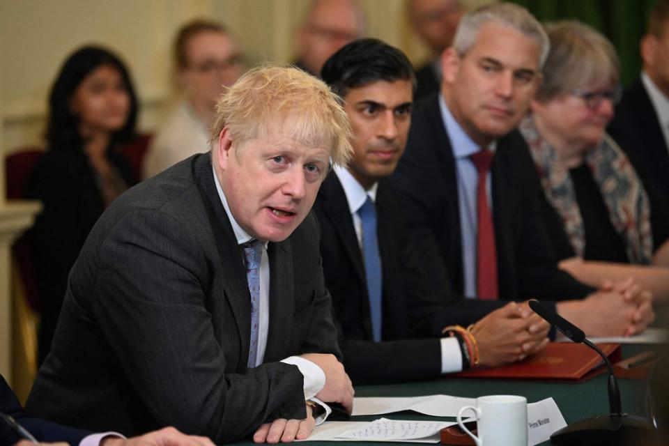 The PM called on his new-look team to ‘work harder’ (POOL/AFP via Getty Images)