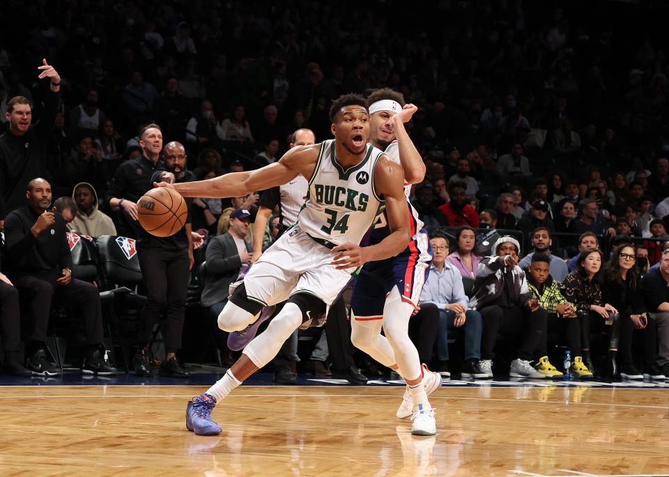 Giannis Antetokounmpo drives during Thursday's game between the Bucks and Nets.