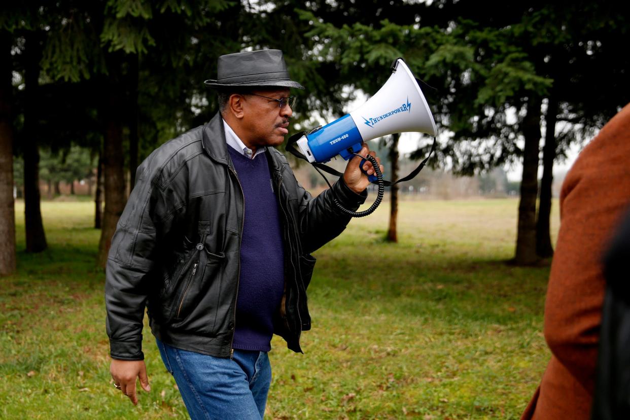 Benny Williams leads a march on Martin Luther King Jr. Day from McKay High School to the Willamette Town Center in Salem in January 2020.