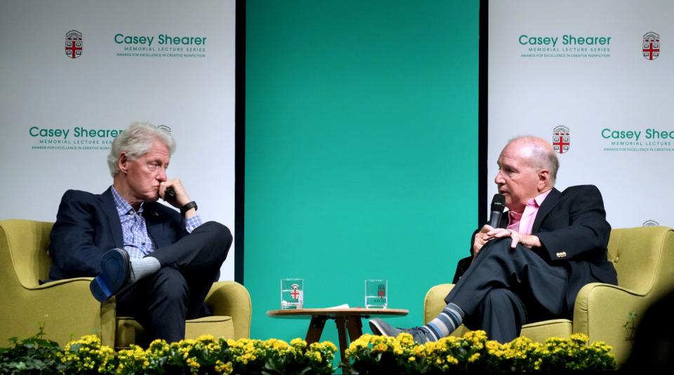 Former President Bill Clinton takes a question from Derek Shearer, the father of Casey Shearer, as part of an annual lecture series held in memory of Casey who was a Brown Class of 2000 graduate. 