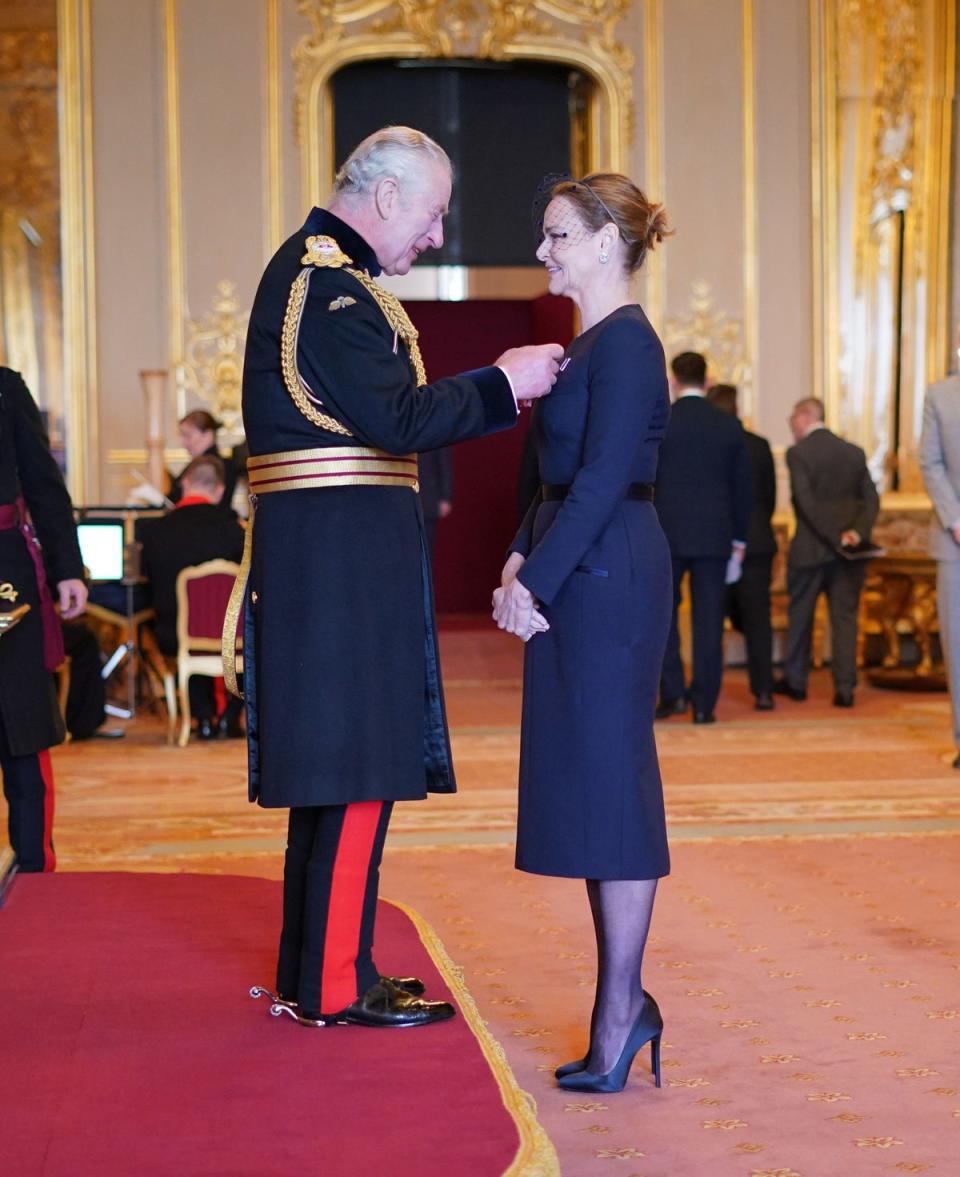 Stella McCartney being made a Commander of the Order of the British Empire by King Charles III (PA)