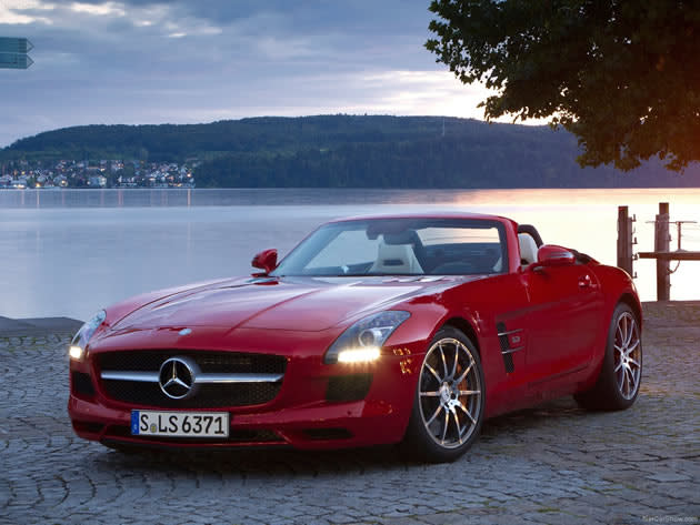 <strong>Mercedes-Benz SLS AMG Roadster: </strong>The signature gull-wing doors and roof have been replaced with conventional doors for the roadster version of the Mercedes-Benz SLS AMG. The SLS AMG Roadster will have an aluminium space frame, AMG 6.3-litre V8 front-mid engine with a peak power output of 563bhp, a seven-speed dual clutch transmission. The fabric soft top opens and closes in 11 seconds and can be operated up to speeds of 50 km/h. (Photo and text by Cheryl Tay)