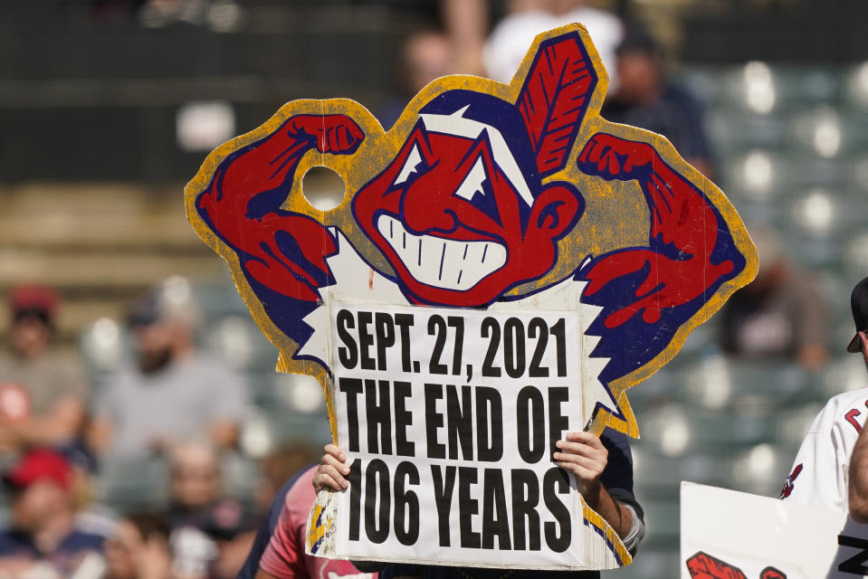 A Cleveland Indians fan holds up a sign during a baseball game between the Kansas City Royals and the Cleveland Indians, Monday, Sept. 27, 2021, in Cleveland. Cleveland plays its final home game against the Royals as the Indians, the team's nickname since 1915. The club will be called the Cleveland Guardians next season. (AP Photo/Tony Dejak)