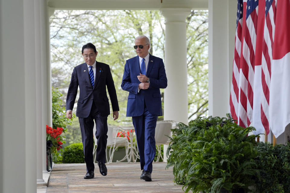 President Joe Biden and Japanese Prime Minister Fumio Kishida walk from the Oval Office to a news conference Wednesday, April 10, 2024. (Evan Vucci / AP)