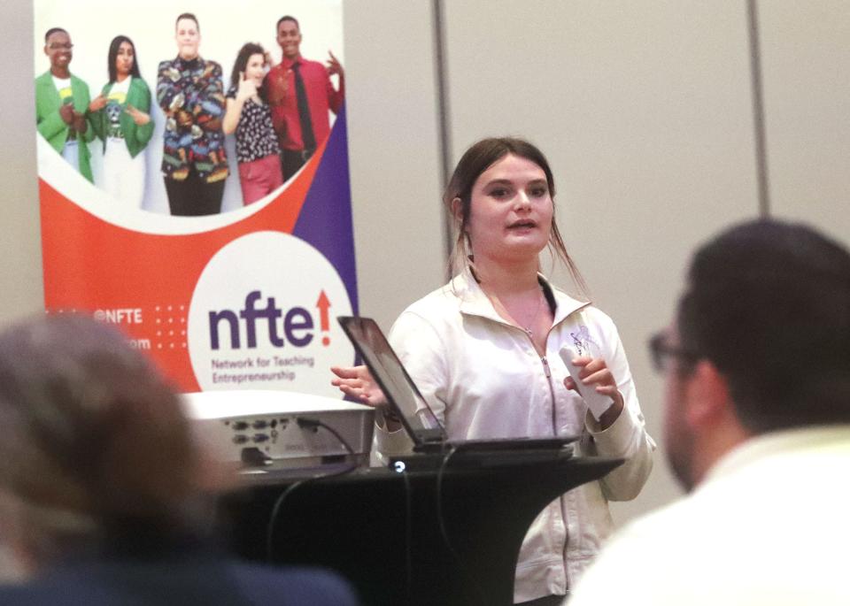 Seabreeze High School student Samantha IaPila pitches her dog-walking business to the judges during the Network for Teaching Entrepreneurship second annual "Shark Tank" style pitch competition for high school students, Wednesday, March 13, 2024, at the Center in Deltona.