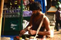 A pan vendor with his 'mobile shop'. Chewing paan, or betel leaves, with a mixture of betel nuts and condiments is a popular pastime.