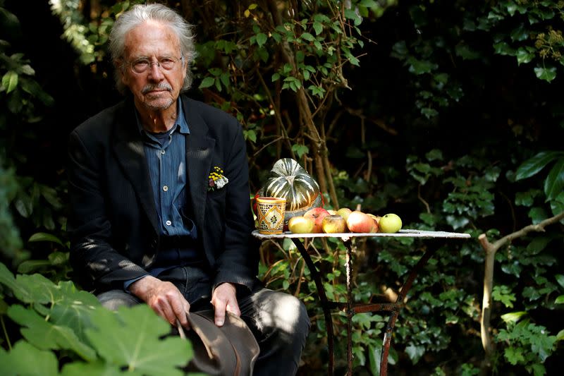 FILE PHOTO: Austrian author Peter Handke, winner of the 2019 Nobel Prize in Literature, poses in his house in Chaville