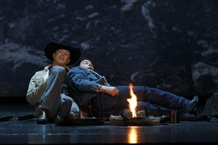 American tenor Tom Randle (Jack Twist) (R), and Canadian bass-baritone Daniel Okulitch (Ennis del Mar), perform during a dress rehearsal of the opera "Brokeback Mountain" at the Teatro Real in Madrid, January 24, 2014. REUTERS/Paul Hanna