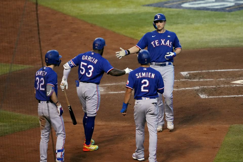 Corey Eager celebrates his home run in the third inning of Game 3.