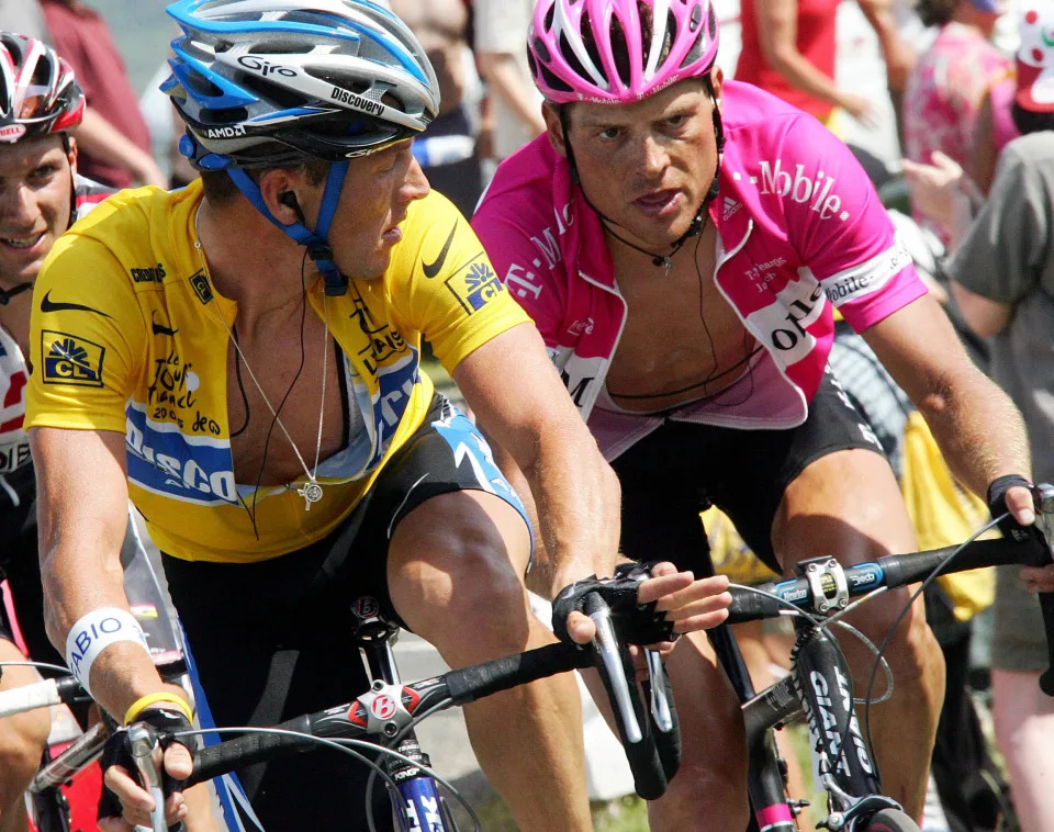 Discovery Channel team rider Armstrong of the U.S. cycles alongside T-Mobile team rider Ullrich of Germany up a Pyrenees mountain pass during the 15th stage of the 92nd Tour de France cycling race.  Discovery Channel team rider Lance Armstrong of the U.S. (L) cycles alongside T-Mobile team rider Jan Ullrich of Germany (R) up a Pyrenees mountain pass during the 205km (127 miles) 15th stage of the 92nd Tour de France cycling race between Lezat-sur-Leze and St-Lary-Soulan, July 17, 2005. Discovery Channel team rider George Hincapie of the U.S. won the stage. REUTERS/Franck Fife/POOL