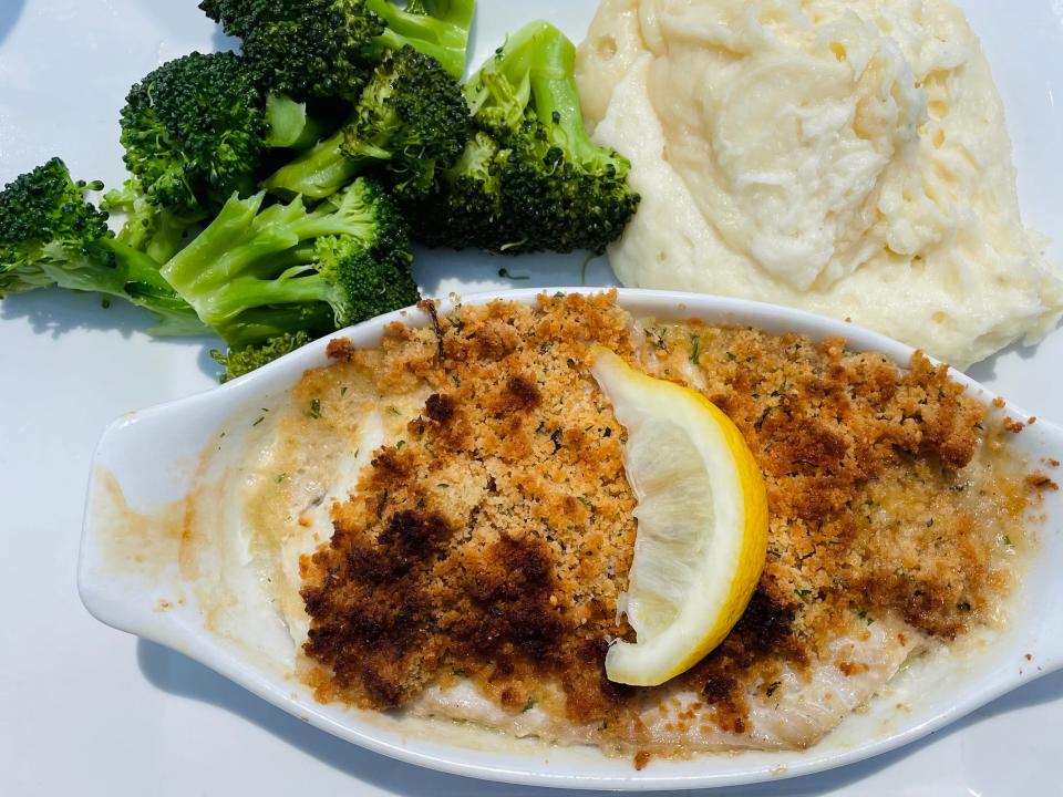 Baked haddock seasoned with Ritz crackers crumbs and a side of broccoli and mashed potatoes.