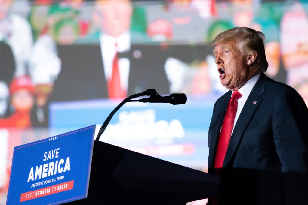 Former US President Donald Trump speaks at a rally on September 25, 2021 in Perry, Georgia. Republican Senate candidate Herschel Walker, Georgia Secretary of State candidate Rep. Jody Hice (R-GA), and Georgia Lieutenant Gubernatorial candidate State Sen. Burt Jones (R-GA) also appeared as guests at the rally. (Photo by Sean Rayford/Getty Images)