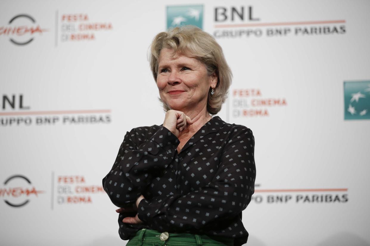 Imelda Staunton poses during a photo call for the movie Downton Abbey at the Rome Film Fest. (AP Photo/Domenico Stinellis)