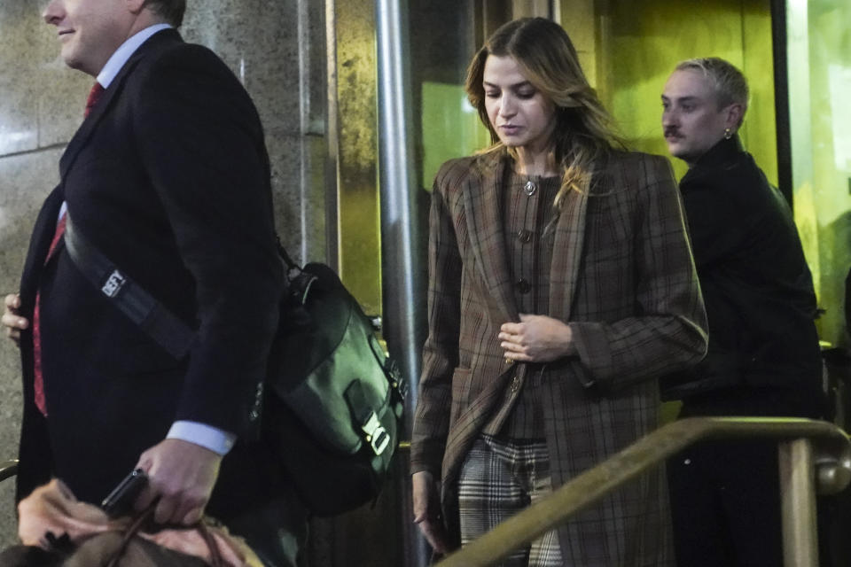 Grace Jabbari, center, the accuser in the assault case against Jonathan Majors, leaves court after giving testimony, Tuesday, Dec. 5, 2023, in New York. (AP Photo/Bebeto Matthews)