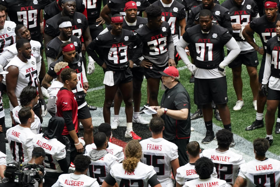 Atlanta Falcons head coach Arthur Smith addresses his team after a voluntary offseason NFL football practice Friday, June 3, 2022, in Atlanta. (AP Photo/John Bazemore)