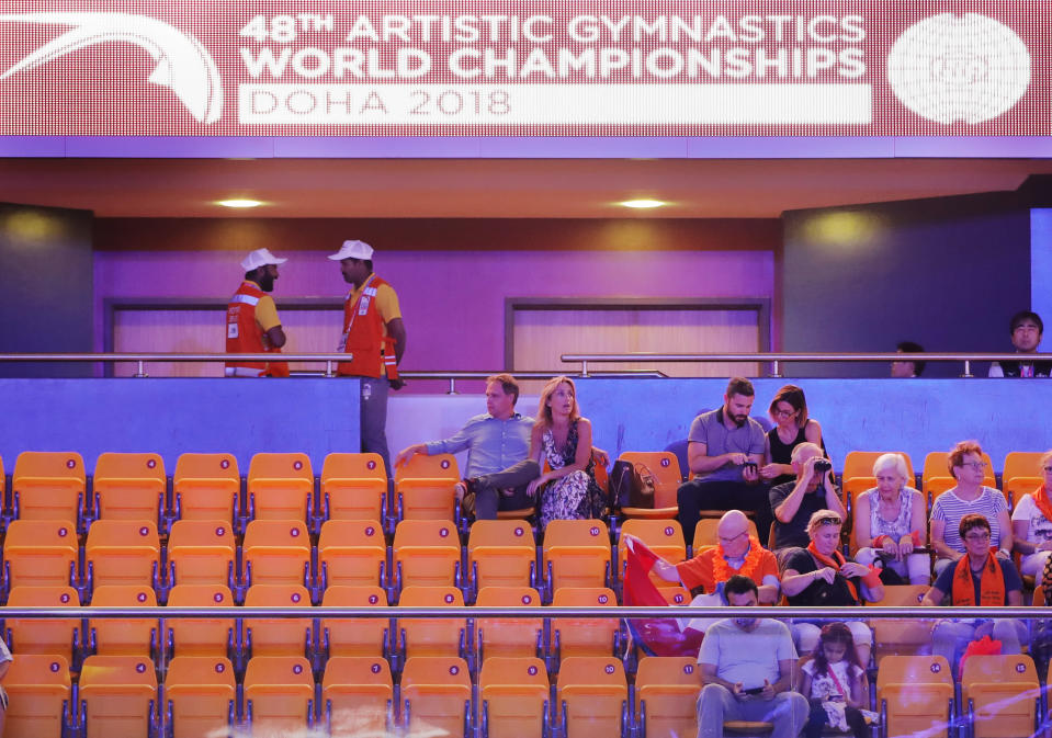 Spectators attend the start of the second and last day of the apparatus finals of the Gymnastics World Championships at the Aspire Dome in Doha, Qatar, Saturday, Nov. 3, 2018. Logistically, Qatar pulled off the 2018 world gymnastics championships largely without a hitch, yet the majority of the 10-day event was played in front of sparse crowds at the Aspire Dome. (AP Photo/Vadim Ghirda)