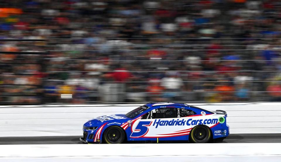 NASCAR driver Kyle Larson blurs past the front stretch of North Wilkesboro Speedway during the NASCAR All-Star race on Sunday, May 21, 2023. Larson would go on to win the race.