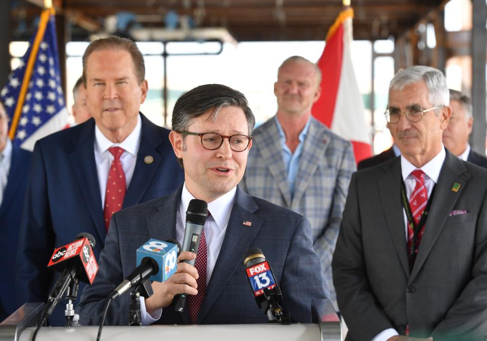 House Speaker Mike Johnson speaks during a press conference Monday at the terminal expansion project at Sarasota Bradenton International Airport. Congressman Vern Buchanan is behind Johnson on the left, Airport CEO Rick Piccolo is on the right. Johnson is in Sarasota for a fundraiser with Rep. Buchanan Monday night.