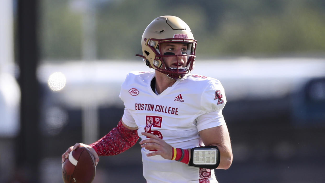 Boston College Eagles quarterback Phil Jurkovec (5) looks to pass during an NCAA football game against the University of Massachusetts Minutemen on Saturday, Sept 11, 2021, in Amherst, Mass. (AP Photo/Damian Strohmeyer)