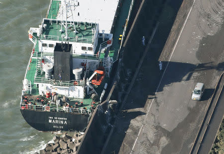 A cargo ship washed ashore by Typhoon Trami is seen in Kawasaki, Japan, in this photo taken by Kyodo October 1, 2018. Mandatory credit Kyodo/via REUTERS