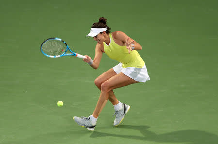 Dubai Duty Free Tennis Championships - Semi-Finals - Dubai, United Arab Emirates - February 23, 2018. Garbine Muguruza of Spain in action against Daria Kasatkina of Russia. REUTERS/Ahmed Jadallah