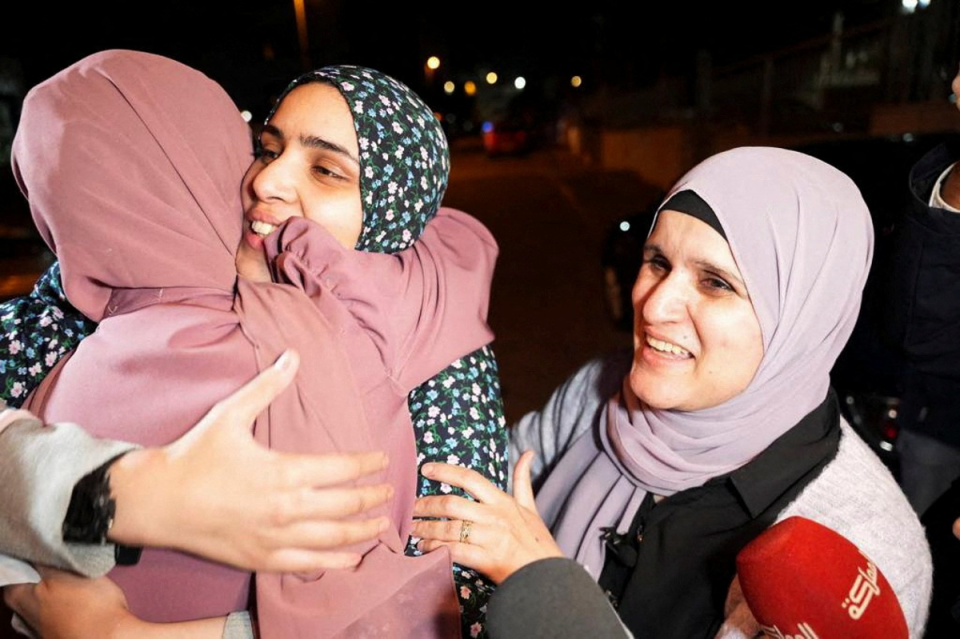 Released Palestinian prisoner Marah Bkeer with family (REUTERS)