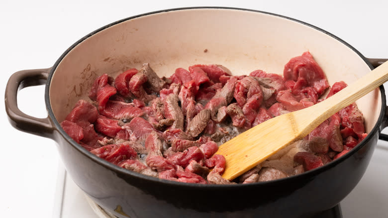 Pan frying beef strips 