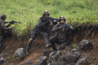 French army soldiers take part in a joint military drill between Japan Self-Defense Force, French army and U.S. Marines, at the Kirishima exercise area in Ebino, Miyazaki prefecture, southern Japan Saturday, May 15, 2021. (Charly Triballeau/Pool Photo via AP)