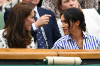 <p>Meghan Markle enjoys at day at Wimbledon with sister-in-law Kate Middleton in 2018. It was the first time Markle had enjoyed the tournament from the royal box. (Getty Images)</p> 
