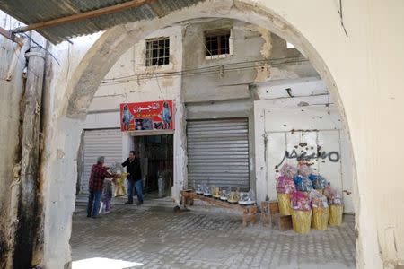 A shopkeeper sells traditional goods at the old popular market known as the Souk al-Jureid, which was destroyed during the war, in Benghazi, Libya February 7, 2019. REUTERS/Esam Omran Al-Fetori