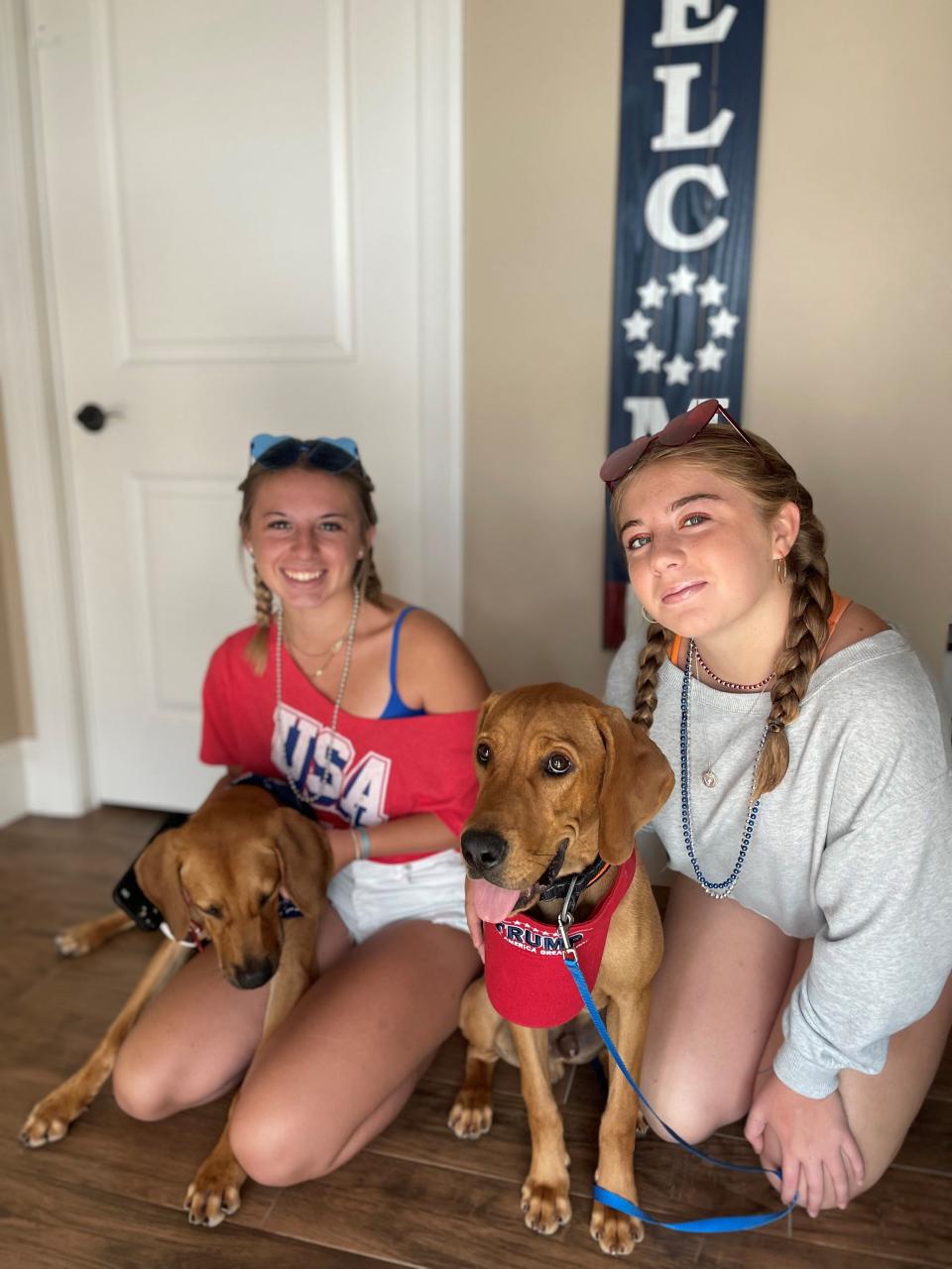 Gunner (right), with his girls and brother.