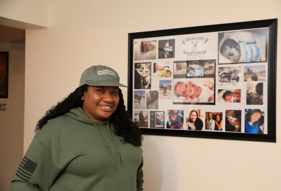 Sharon Toney-Finch beside a collage dedicated to her son, Yerik Israel Toney, the namesake of YIT Foundation in Monticello on December 6, 2022. The YIT Foundation's mission is to raise awareness of premature births and support families who's children are premature. 