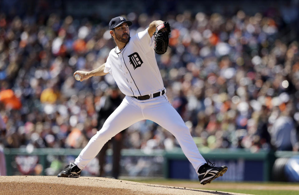 Detroit Tigers starting pitcher Justin Verlander throws during the first inning of a baseball game against the Baltimore Orioles in Detroit, Sunday, April 6, 2014. (AP Photo/Carlos Osorio)