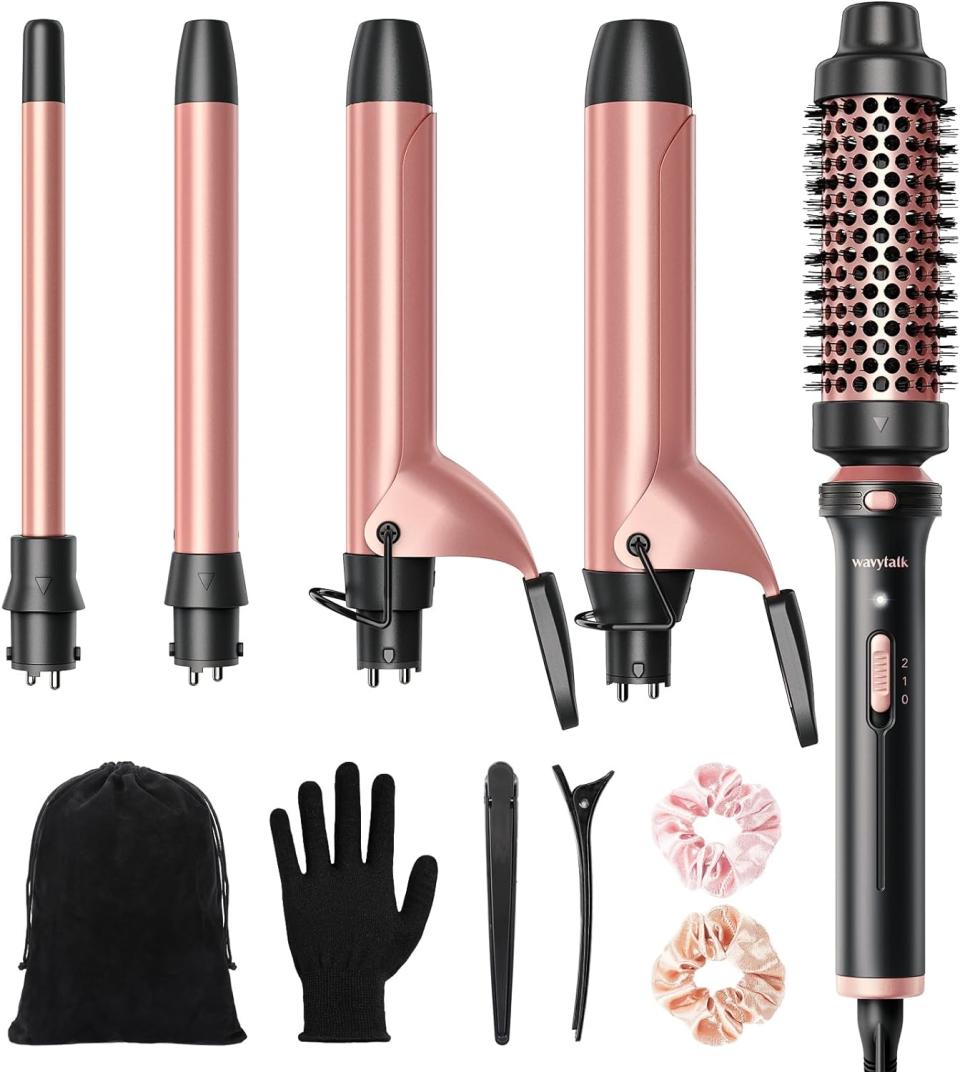 pink and black hot air brush with five attachments