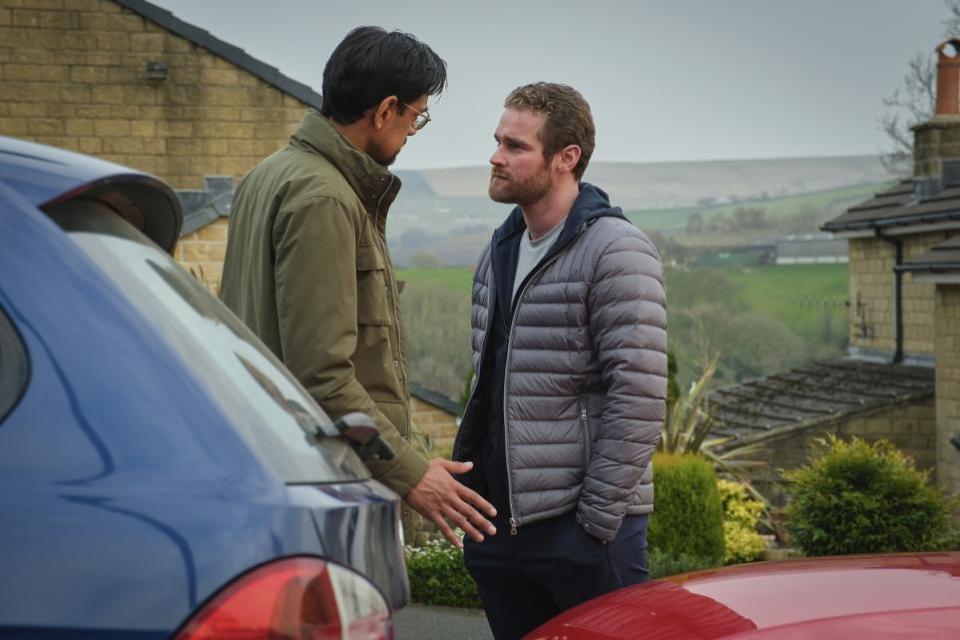 Bradford Telegraph and Argus: From left, Faisal Bhatti, played by Amit Shah, in conversation with Rob Hepworth, played by Mark Stanley, during episode four