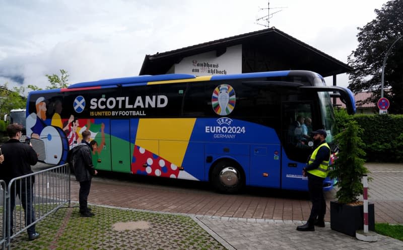 The Scottish team bus arrives at the team hotel ahead of the UEFA EURO 2024. Andrew Milligan/PA Wire/dpa