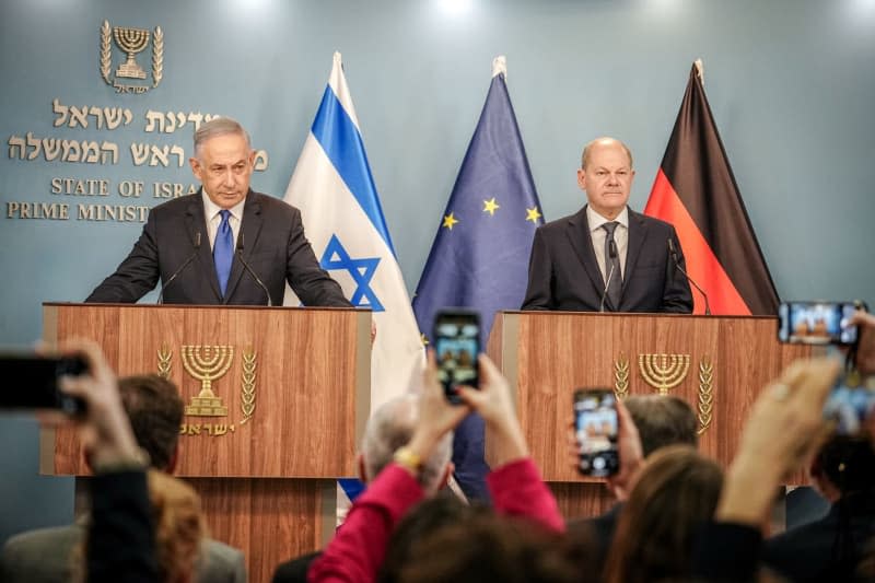 German Chancellor Olaf Scholz and Israeli Prime Minister Benjamin Netanyahu hold a joint press conference. Scholz is scheduled to meet Israeli President Isaac Herzog and War Cabinet Minister Benny Gantz as well as relatives of Israeli hostages held in Gaza alongside Netanyahu. Kay Nietfeld/dpa