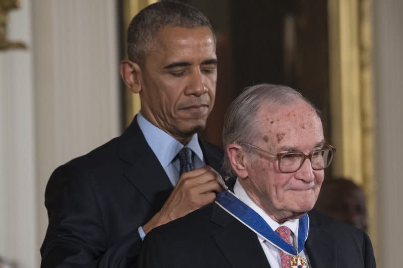 President Barack Obama awards attorney Newt Minow the Presidential Medal of Freedom during a ceremony in the East Room at the White House in Washington, D.C., on November 22, 2016. On May 9, 1961, in a speech to TV executives at the National Association of Broadcasters convention, new Federal Communications Commission Chairman Minow referred to television as "a vast wasteland." File Photo by Pat Benic/UPI