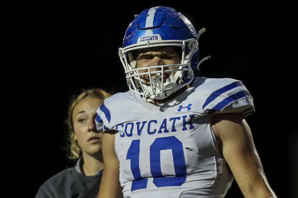 Covington Catholic tight end Willie Rodriguez (10) walks off the field after getting injured in the first half against Cooper High on Sept. 23, 2022. Rodriguez pleged to UK on June 23.