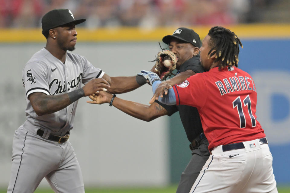 Aug 5, 2023; Cleveland, Ohio, USA; Umpire Malachi Moore tries to separate Cleveland Guardians third baseman Jose Ramirez (11) and Chicago White Sox shortstop Tim Anderson (7) after Ramirez slid into second with an RBI double during the sixth inning at Progressive Field. Mandatory Credit: Ken Blaze-USA TODAY Sports